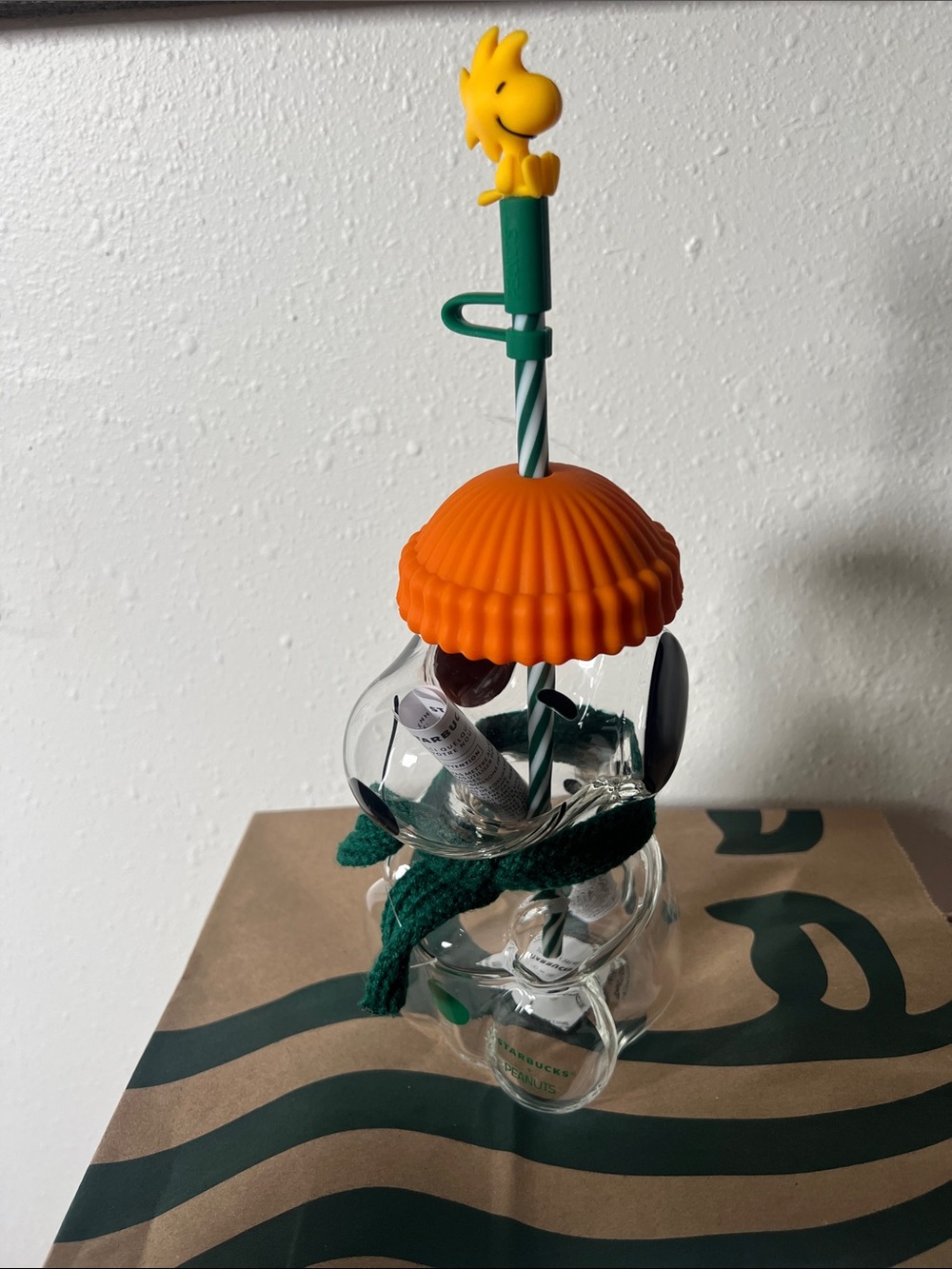 Starbucks Clear Glass Snoopy Shaped Tumbler with Orange Hat and Green Scarf